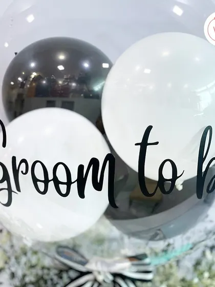 The "Groom to be" balloon, a fun and festive centerpiece for a pre-wedding gift hamper.
