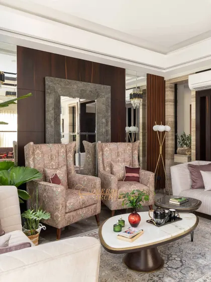 A close-up of the seating arrangement, showing the mix of patterned and solid fabrics that add texture and interest.
