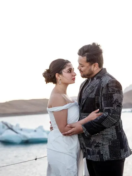 Another angle of the couple in Iceland, showcasing their unique and coordinated pre-wedding shoot style. It's about complementing, not matching.