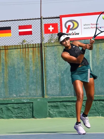In action during the final of the ITF W25 Solapur. These photos show different aspects of my game under pressure, from hitting a running forehand to maintaining balance on a two-handed backhand.