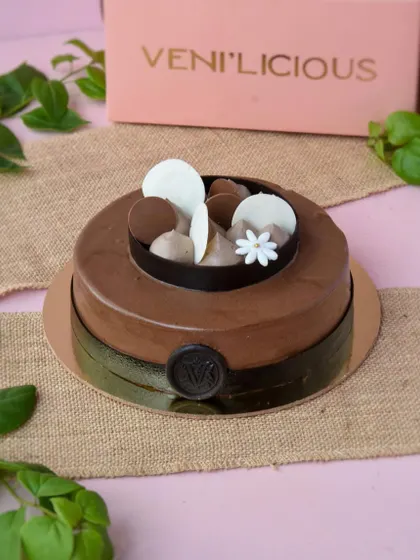 Our Celebration Chocolate Cake, designed for those extra special moments. It’s an indulgent treat that’s sure to make any occasion memorable.