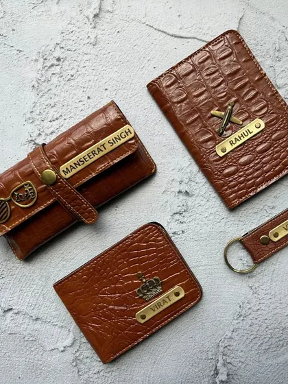 For a touch of luxury, I offer this croc-textured accessory set for men. This 4-in-1 combo includes a wallet, eyewear case, passport cover, and keychain, all customizable with a name and charm.