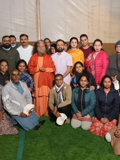 A memorable moment from our Kumbh Mela yatra, meeting with Swami Chidanand Saraswati at the Parmarth Camp.