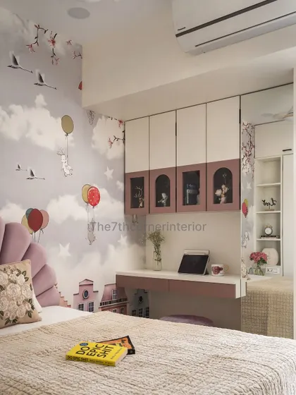 This image showcases the complete kids' room setup, including the bed, whimsical wallpaper, and the custom study desk with overhead storage, creating a perfect space for a young dreamer.