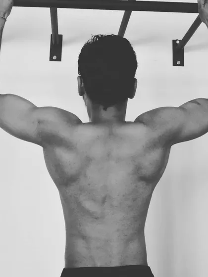 Building a strong back is essential for lifelong health and athletic performance. This shot shows the result of consistent pull-up training and back workouts. We focus on developing this kind of functional muscle that supports you in everything you do.