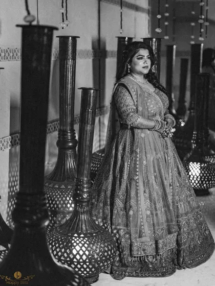 A classic black and white version of the bride's portrait, adding a timeless and sophisticated feel to her engagement look.