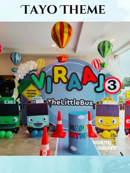 All aboard for Viraaj's third birthday with this Tayo the Little Bus theme. We recreated the world of Tayo with colorful bus cutouts, traffic cones, and hot air balloon accents for a fun and busy celebration.