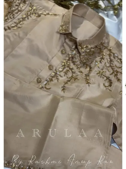 The complete set, showing the custom beige silk kurta and matching pants. This is a versatile outfit that can be styled with a shawl for a more traditional look.