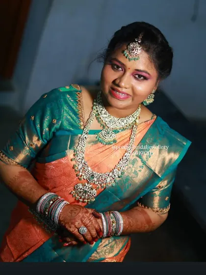 A beautiful portrait of the bride, showcasing the full AD and emerald stone set.