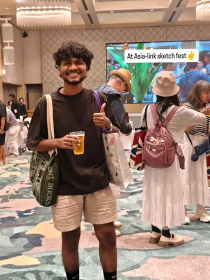 My happy world. A photo of me at the Asia-link Sketch Fest in Phuket, enjoying the creative atmosphere.