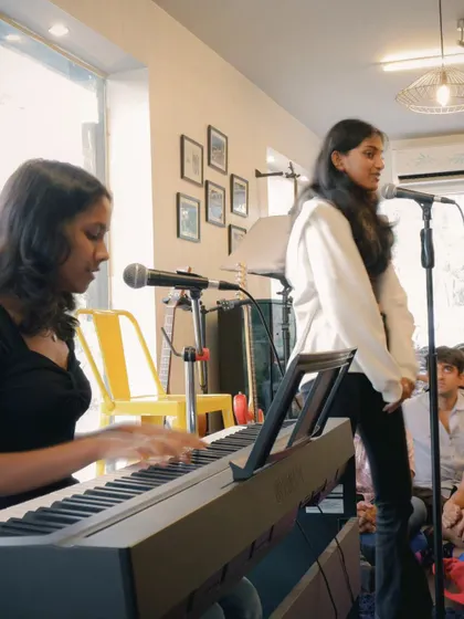 A piano and vocal duet during one of our open performance days. We encourage students to collaborate and create music together in a supportive setting.