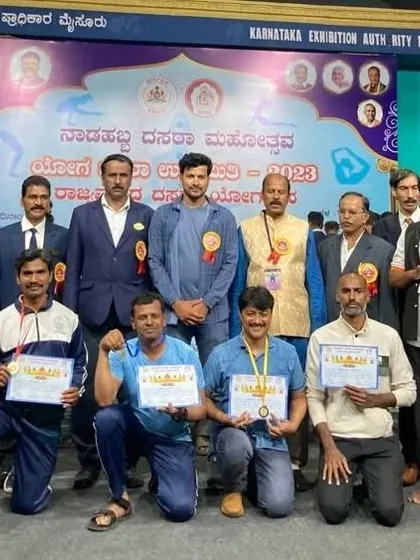 A duplicate image showing the group of winners at the Dasara Yogasana Competition in 2023.