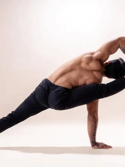 This advanced posture demonstrates the strength and flexibility that can be achieved through dedicated practice. In my classes, we work step by step to build the foundation required for such asanas safely.