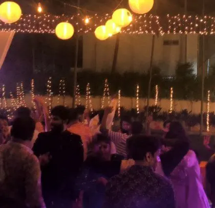 The crowd is enjoying the mix of South Indian music.