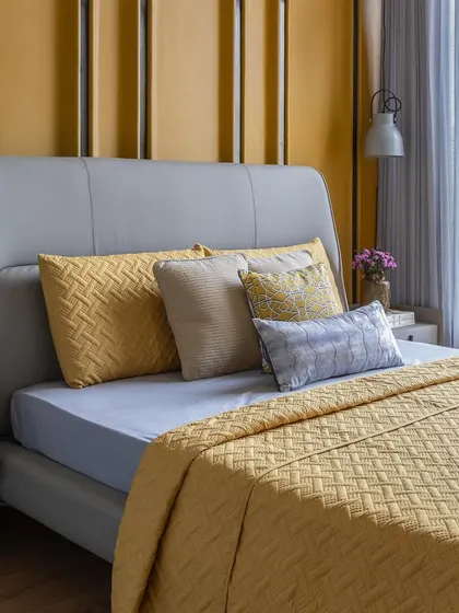 This series showcases different serene bedroom styles. From the bold red headboard with mirrored wardrobes to the calming green Murphy bed, each space is a sanctuary of calming colors and soft textures.