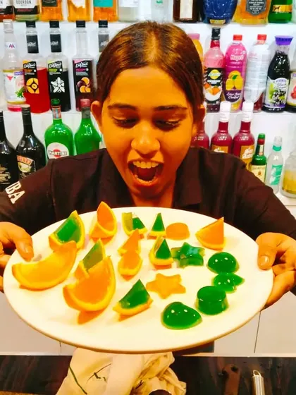 A student's excited reaction to the colorful and fun edible jellies created during our molecular mixology class.