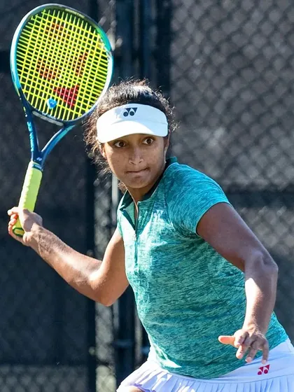Sahaja prepares to strike a forehand, showcasing the solid technical foundation built through years of dedicated practice.