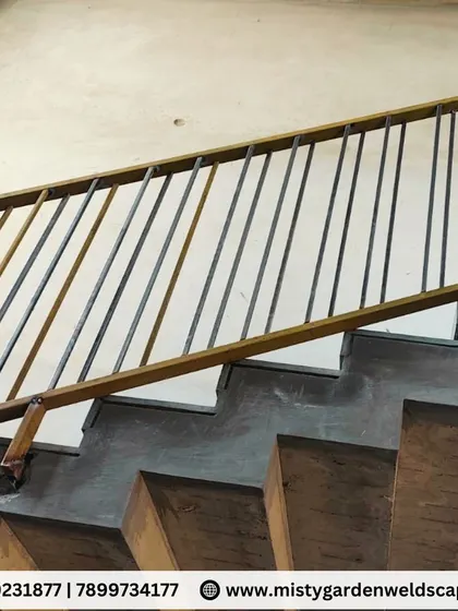 A detailed shot of the simple yet effective railing design. The focus here is on strength and durability, providing a safe barrier without obstructing the view.