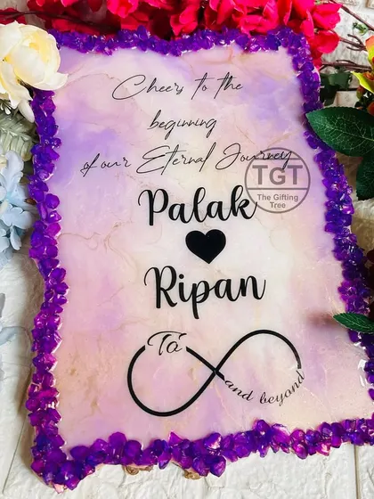 This 9x12 inch wedding plaque features a romantic quote and the couple's names. The agate-style border is made of vibrant purple crystals.