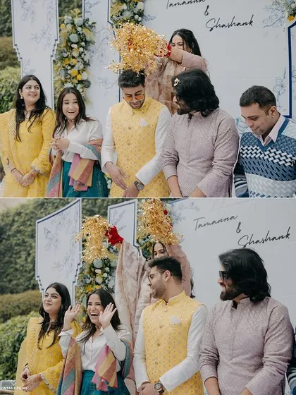 A candid moment from the Haldi ceremony, capturing the fun and playful rituals with family and friends. These are the unscripted memories that make a wedding special.