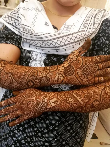 A full back hand bridal design that is dense with detail. I used a combination of hearts, paisleys, and floral elements to create a rich and textured look perfect for a bride.