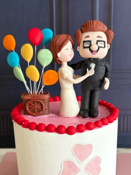 Inspired by Carl and Ellie’s timeless love story from the movie "Up," this cake is a sweet tribute to an enduring romance.