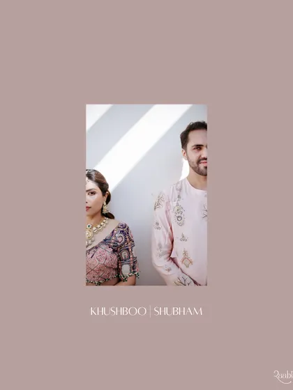 A creative, minimalist portrait of the couple, with their faces partially obscured, set against a dusty rose background.