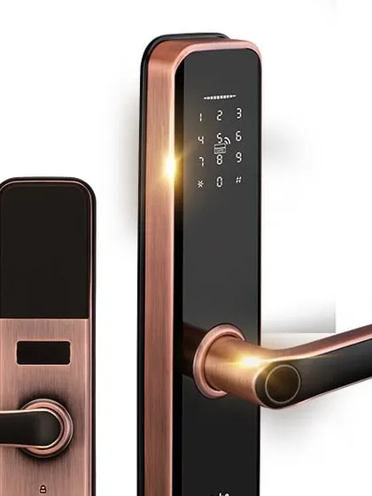 A close up view of a copper finish smart lock, highlighting the illuminated numeric keypad for easy use in low light conditions. The sleek design adds a touch of modern elegance to any entryway.