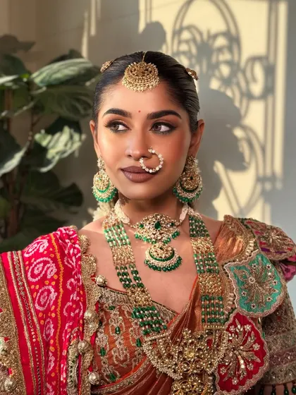 Bathed in natural light, this shot shows the true-to-skin finish of the makeup. The bride looks radiant and authentically beautiful.