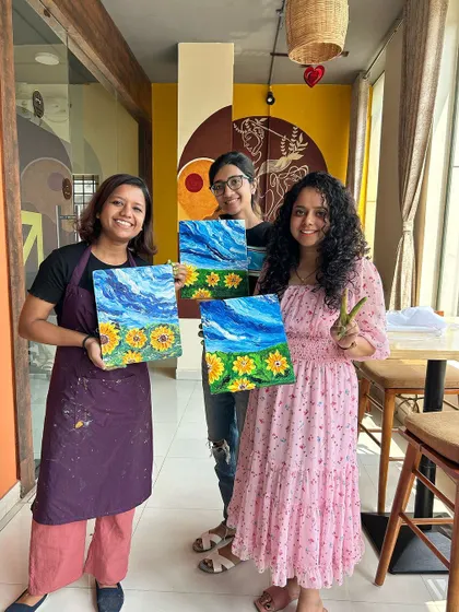 Here I am with two participants and their beautiful sunflower paintings. It's always a joy to see the final results.
