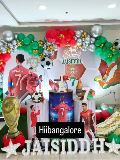 We love a challenge, and this Cristiano Ronaldo football-themed birthday party was a big win. We created custom backdrops, life-sized player cutouts, and balloon arrangements in team colors to bring the stadium vibe to the celebration.
