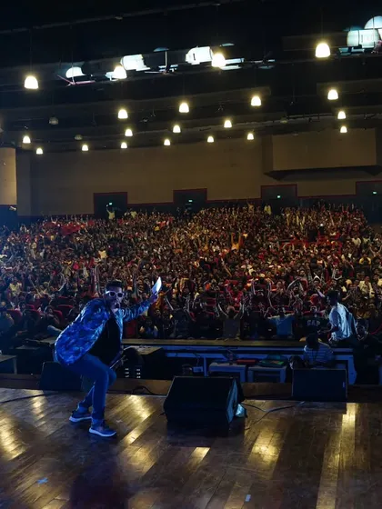 This is where I feel most at home, on a big stage, connecting with a massive, energetic audience. Capturing the electrifying vibe of a packed auditorium at IIT Bombay's Techfest is what I live for.