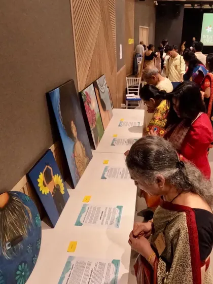 A crowd of people viewing my art series. It was a dream come true to have my work seen and appreciated by so many.