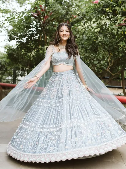 Aayushi looking like a princess in her powder blue lehenga. The makeup is kept fresh and minimal to let her and the outfit shine.