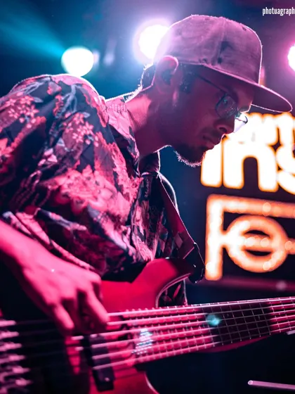 Our bassist, Alan, holding down the low end with focus and style. His grooves are the foundation we build our sound on.