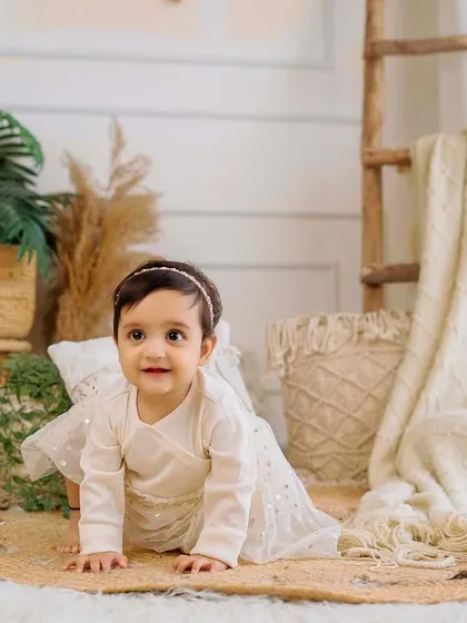 On the move. Capturing these early crawling moments is a key part of milestone photography, preserving the memory of their first explorations.