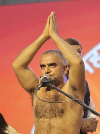 A Jain monk delivering a powerful address at the Nesco event. Our audio systems are calibrated to deliver clear speech to every corner of the vast hall.