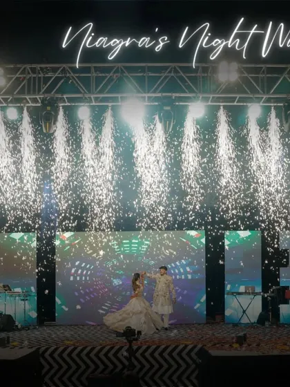 This is what a Sangeet masterpiece looks like. We designed and executed this spectacular stage, complete with a waterfall of pyrotechnics, to create a night of pure cinematic magic for the couple's first dance.