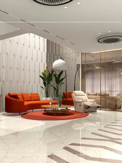 Another view of the living area, showcasing the curved orange sofa on a circular rug, which creates a distinct and energetic social zone. The design uses bold color and form to define different functional areas within the open-plan space.