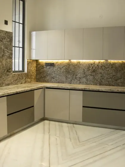 The final view of the proposed kitchen design, highlighting the under-cabinet lighting which adds warmth and provides excellent task lighting for the countertop.