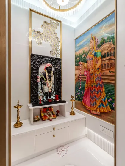 The other side of the mandir features another beautiful painting of Radha ji, creating a symmetrical and harmonious design. The space is illuminated with soft, warm light to create a serene atmosphere.