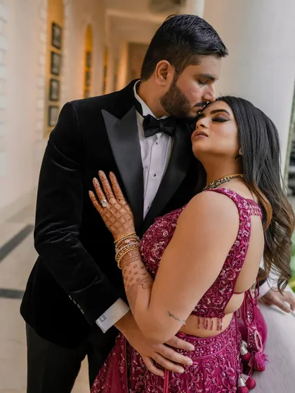 A stunning reception look at the Taj Westend. We use dramatic lighting and elegant backdrops to create sophisticated and timeless portraits for your evening events.