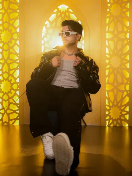 A dynamic, low-angle shot that adds energy and power to a men's fashion photo.