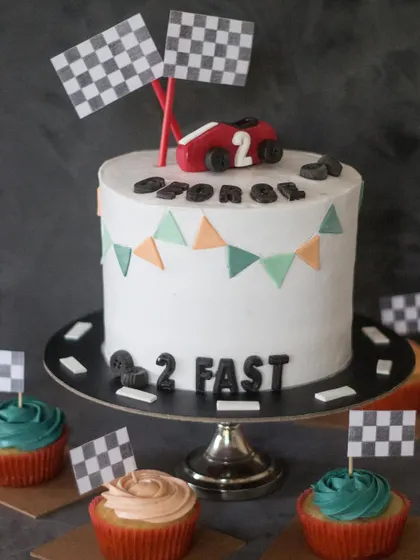 I love a fun theme! This "2 Fast" racing cake and matching cupcakes were for a little boy's second birthday. I can create custom designs for any party, from kids' superhero themes to more grown-up celebrations.