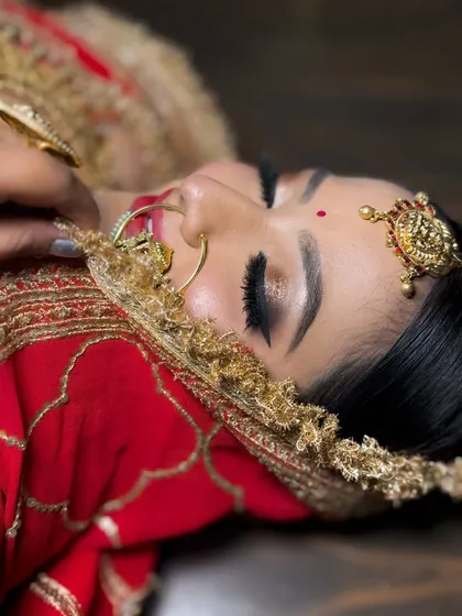 A detailed close-up of a glitter cut-crease eye makeup look. This technique creates a sharp, defined eye that looks incredibly glamorous.