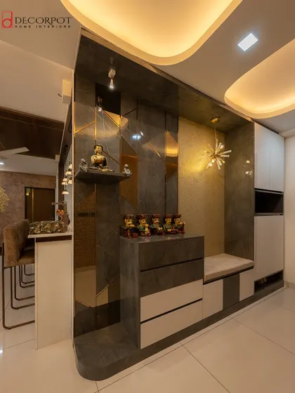 A closer view of the luxurious foyer partition, showing the marble-clad finish, gold inlays, and integrated display shelf. The design exudes modern opulence.
