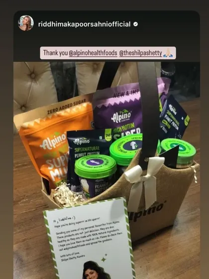 Designer Riddhima Kapoor Sahni with her Alpino hamper, showing the wide and influential audience my gifting services can help you reach.