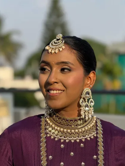 A candid smile during the photoshoot. I believe in having fun, even when we're working on getting the perfect shot.