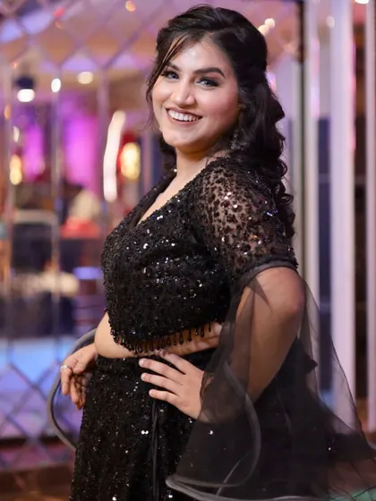 A happy and confident client, ready to dance the night away. The makeup is designed to be long-lasting and photo-ready.