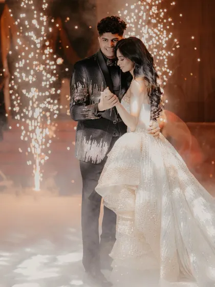 A romantic dance surrounded by smoke and cold pyro effects, creating a magical atmosphere.